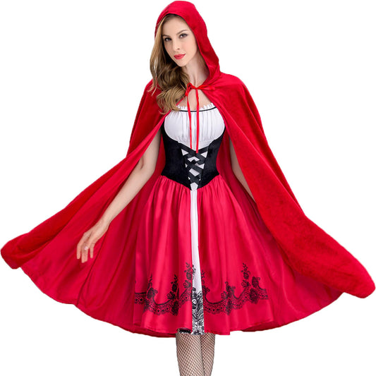 Woman wearing red riding hood costume cape