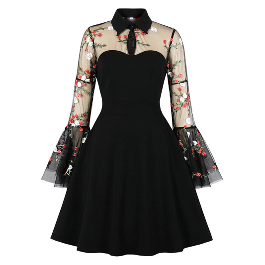 Woman wearing black gothic mesh dress